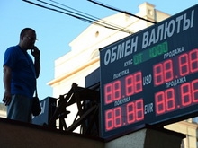 "Второй раунд" ослабления рубля ожидается в середине 2014 года